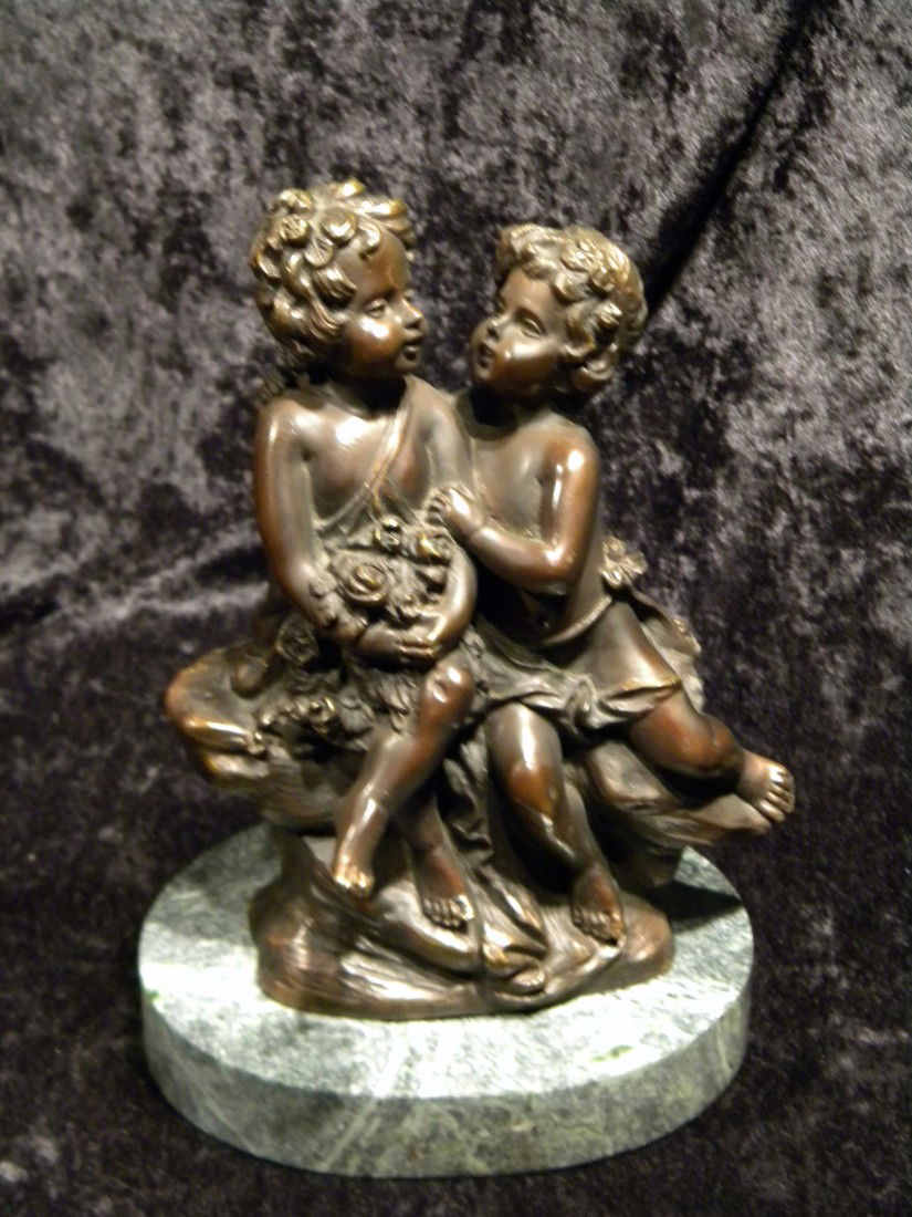 Vintage Bronze Statue of 2 Young Children: Vintage bronze statue of two young children sitting together, signed Aug. Moreau, on green marble base, 8.5" high overall.