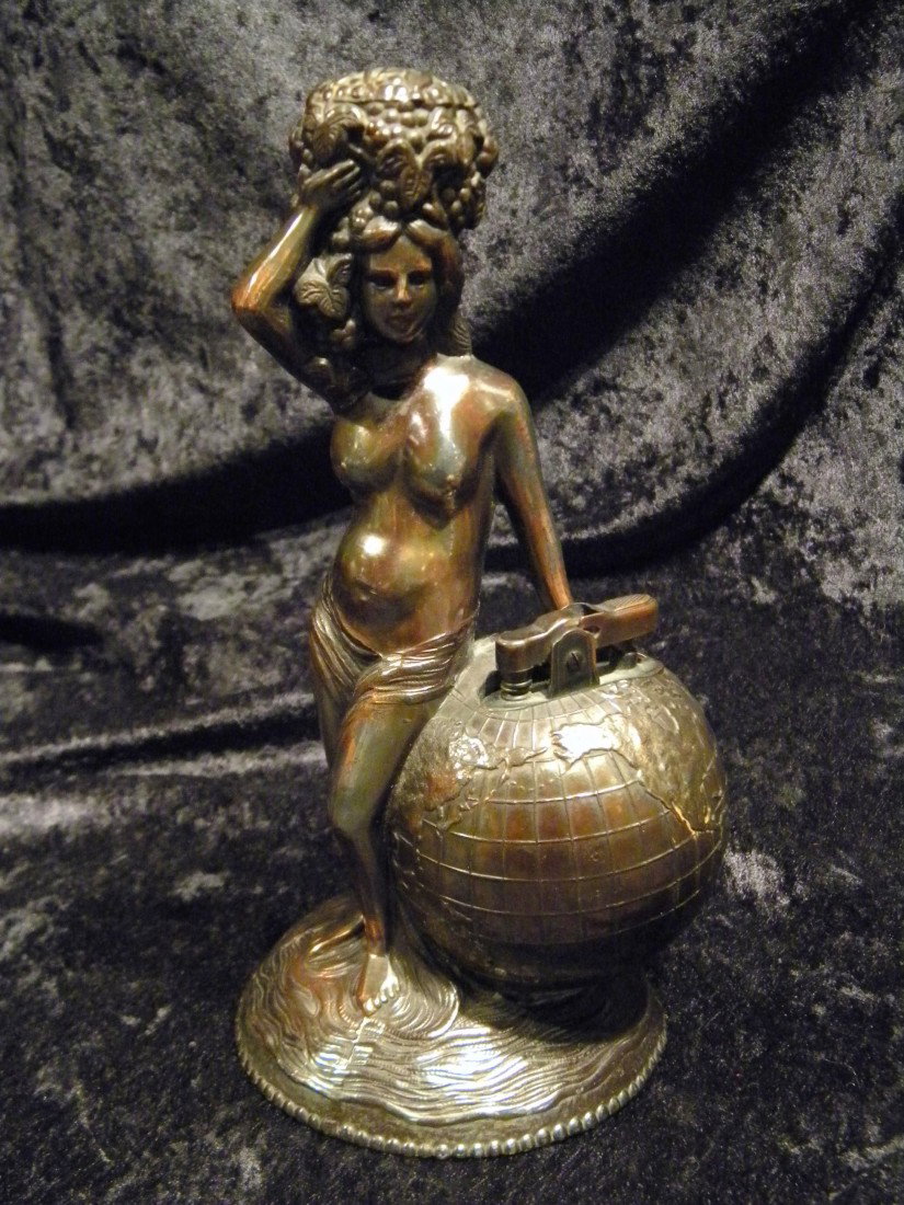 Brass Cigarette Lighter Semi-Nude Woman w/Globe: Brass cigarette lighter of semi-nude woman leaning against globe, 7.75" high