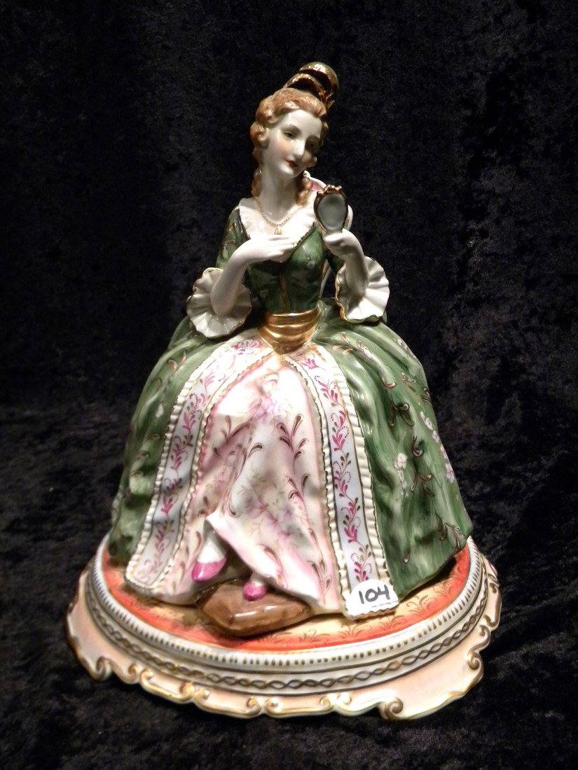 Dresden Germany Porcelain Seated Lady w/Mirror: Dresden, Germany porcelain lady seated in chair holding hand mirror - 12" high. Damage to feather in Lady's hair.****DUE TO THE FRAGILE NATURE OF THIS ITEM, WE STRONGLY RECOMMEND PROFESSIONAL PACKING 