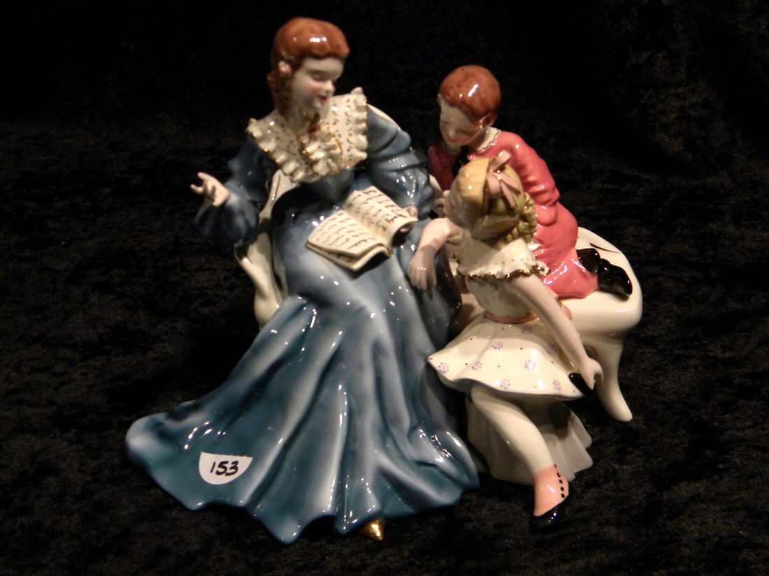 Florence Ceramics, California Figurines: Florence Ceramics, California glazed figural group: mother reading to two children "Storybook Hour" - 7" high, 8.25" across.****DUE TO THE FRAGILE NATURE OF THIS ITEM, WE STRONGLY RECOMMEND PROFESSION