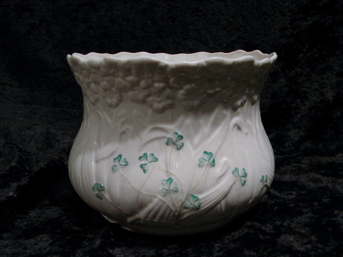 Belleek Parian China "Daisy" Planter: Belleek Parian China "Daisy" planter, 5.75" high, 7" diameter, with original box. Green mark on bottom. Made in Ireland.