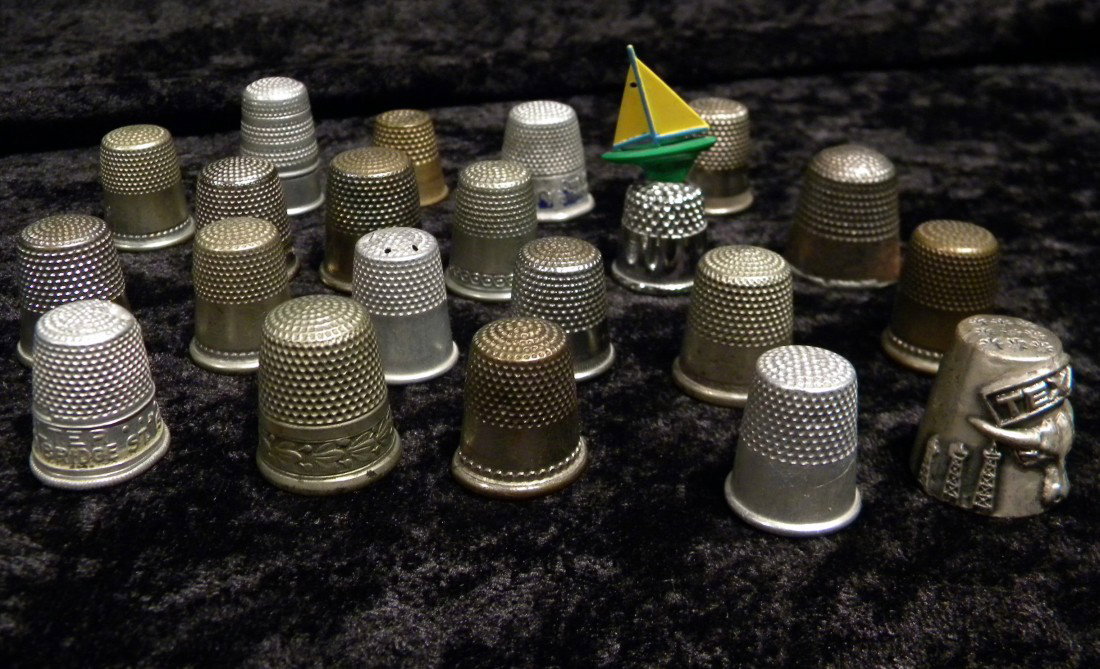 Lot of 21 Metal Thimbles: Lot of 21 metal thimbles, all approximately 1" high.