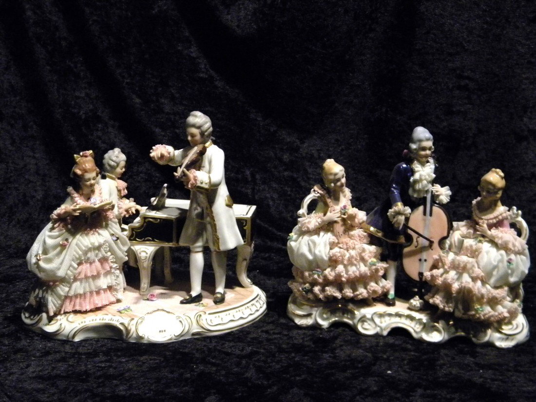 Two Dresden style glazed porcelain figural musical grou: Two Dresden style glazed porcelain figural musical groups: young boy seated at piano, standing man playing violin and standing lady singing, (damage to lace), marked in blue on back (Crown), 9" high, 