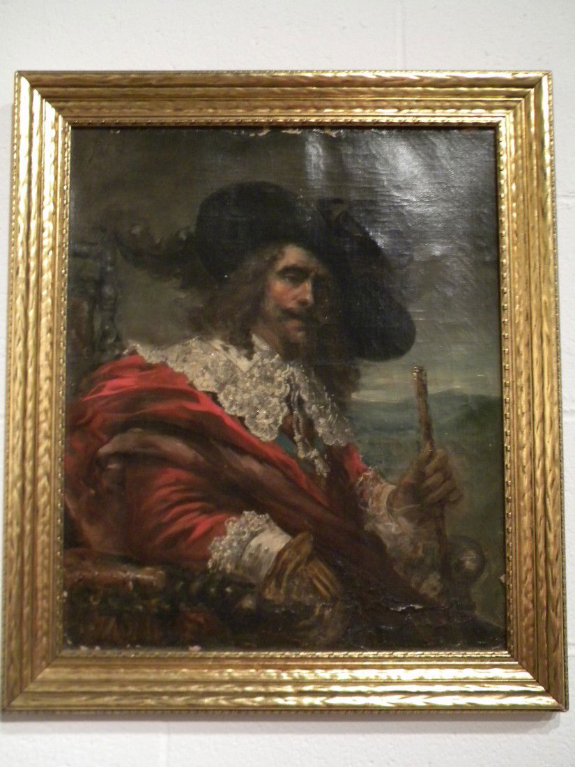 Antique Oil on Canvas Depicting Cavalier, Signed Patri: Antique framed oil on canvas depicting man in black feathered hat and red coat with ruffled white trim, long brown hair and mustache (Cavalier style) seated on chair with ocean in background, signed u