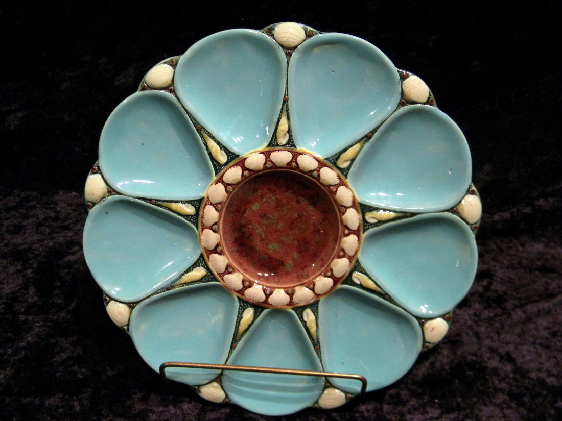 Minton Majolica Glazed Oyster Plate, Red Mark: Minton majolica glazed oyster plate decorated with small shells, red mark, 10" diameter.