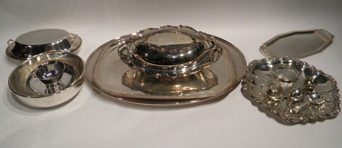 Lot of Silver Plated Items: Lot of Silver Plated Items: Round Bowl, small pedestal bowl, 2 covered oval serving trays, small oblong tray, 2 large serving trays, many small plated items.