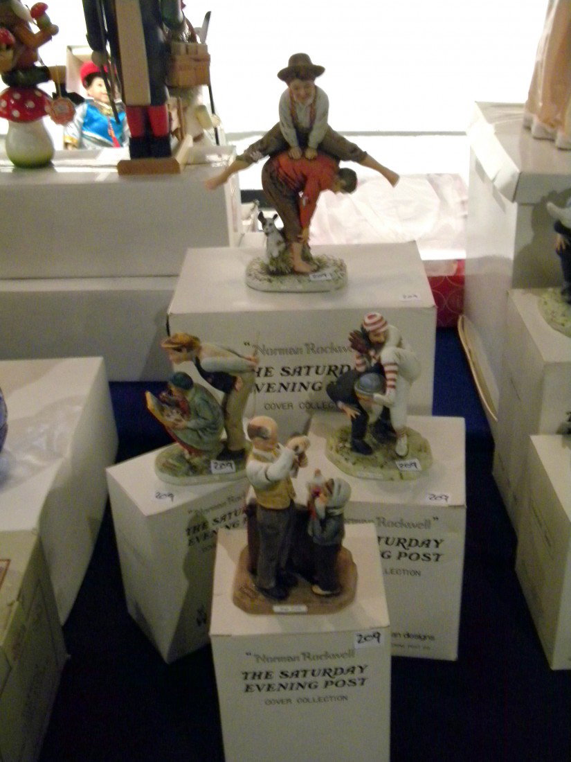 4 Grossman Norman Rockwell Figurines: 4 Dave Grossman Designs "Norman Rockwell" The Saturday Evening Post cover Collection Figurines including "Country Critic" (5 1/2" x 4" x 2 1/2"), 100th Year of Baseball" (6" x 4" x 3 1/2"), "Magic Pot
