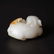 A CARVED RUSSET JADE LION - 2