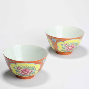 A Pair Of Coral Red-Ground Famille Rose Floral Bowls: A Pair Of Coral Red-Ground Famille Rose Floral Bowls 清雍正 珊瑚红底粉彩开窗花卉碗