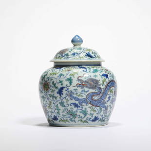 A Wucai Dragon Interlocking Lotus Jar And Cover: A Wucai Dragon Interlocking Lotus Jar And Cover 清乾隆 五彩龙纹缠枝莲纹罐