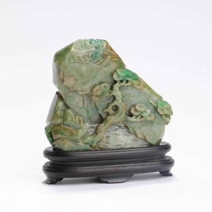 A Carved Jadeite Mountain Boulder: A Carved Jadeite Mountain Boulder 清中期 翡翠雅集山子
