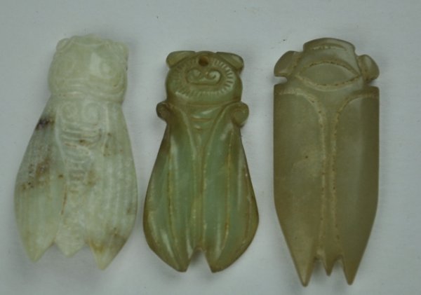 A GROUP OF THREE CICADA JADE PENDANT.( HAN DYNASTY: A group of three cicada jade pendant. ( HAN DYNASTY)1 5/8'' L