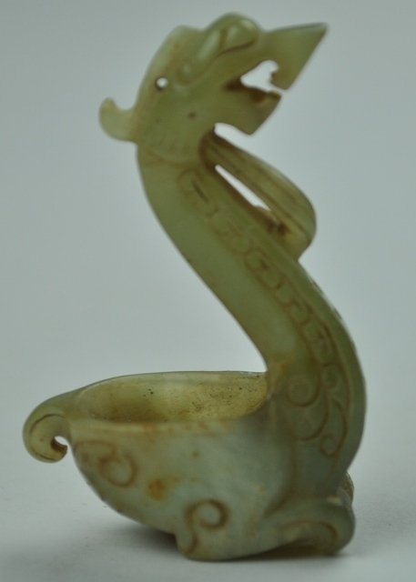 A YELLOW JADE CARVING OF DRAGON BOAT PENDANT. ( HAN: A yellow jade carving of dragon boat .( HAN DYNASTY) 2'' H