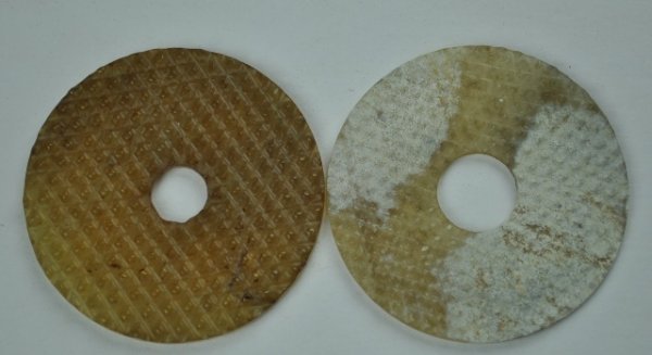 A PAIR OF TWO JADEDISC. ( HAN DYNASTY): A pair of two jade disc .(HAN DYNASTY)2 3/16'' DIAM