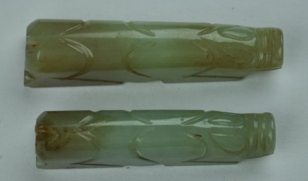 A PAIR OF GREEN JADE PIGS.( HAN DYNASTY): A pair of green jade pigs.( HAN DYNASTY)2 3/4'' 2 1/2''