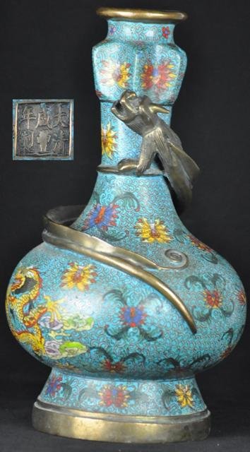 A CLOISONNE ENAMEL BOTTLE DRAGON VASE.(MARK AND PER: A cloisonne enamel bottle dragon vase decorated with dragons chasing a pearl and the vase surrounded by a gilt bronze dragon.(Mark And Period Of Xianfeng) 16''H