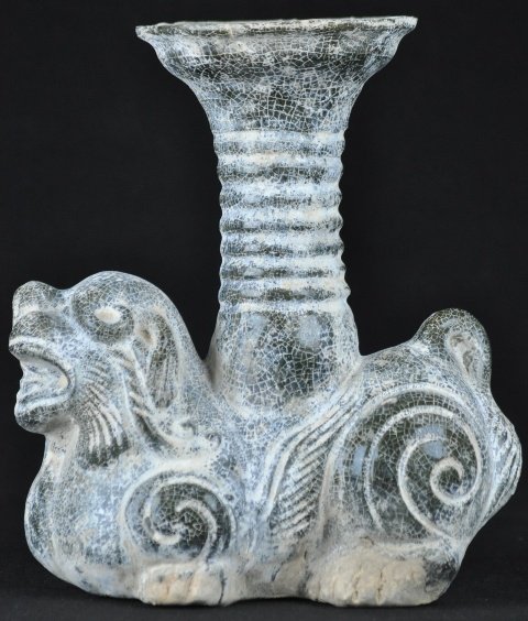 A GREEN-GLAZED OIL LAMP.(HAN DYNASTY): A green-glazed oil lamp.(Han Dynasty) 9 1/4'' in High