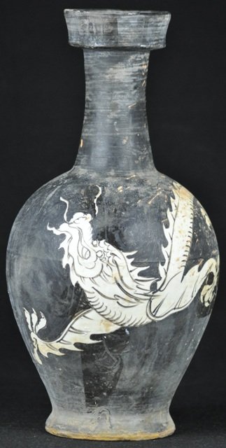 A CI ZHOU DRAGON VASE.(SONG DYNASTY): A ci zhou dragon vase painted with a white dragon surrounding the vase.(Song Dynasty) 15 1/4''in Tall