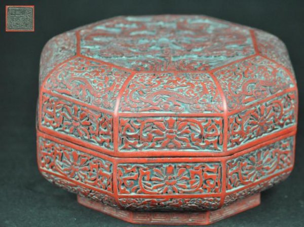 A CINNABAR LACQUER BOX AND COVER.(MARK AND THE PER: A cinnabar lacquer box and cover.(mark and period of qing long) 5 1/2'' tall x 8 1/2 wide
