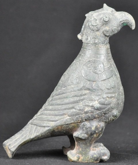A BRONZE BIRD .(SHANG/WESTERN ZHOU DYNASTY): A bronze bird .(shang/western zhou dynasty)10''H
