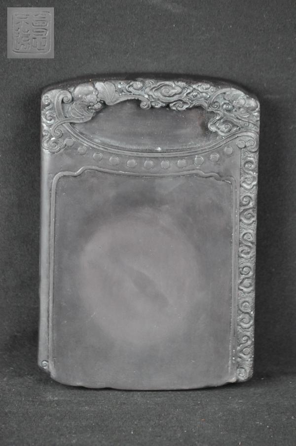 A DUAN STONE INK STONE.(MARK AND PERIOD OF YONG ZHE: The top of the ink carved two bats and clouds surrounded contians a poem and yong zheng seal. 1''Hx 8 1/2''x5''