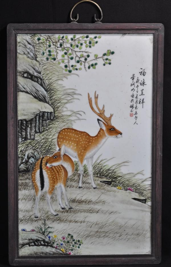A FAMILLE-ROSE WOOD PLAQUE.(EARLY 20 CENTURY): Painted with two deer and landscape scene dated and sealed. 23 1/4'' x 15''