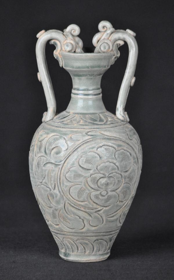 A CELADON -GLAZED YAOZHOU AMPHORA (SONG DYNASTY): a celadon-glazed yaozhou a mphora. 10 1/2'' (SONG DYNASTY)