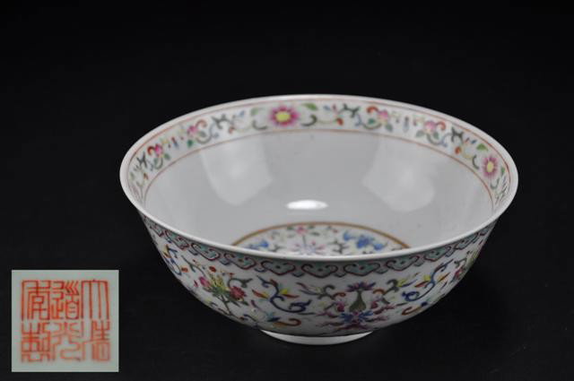 A FAMILLE-ROSE BOWL. (MARK AND PERIOD OF DAOGUANG): The exterior decorated with lotus scroll and interior painted with bats and florals.six character mark in blue. 3 1/2''x 7''in PROVENANCE: FROM CHICAGO PRIVATE COLLECTION.