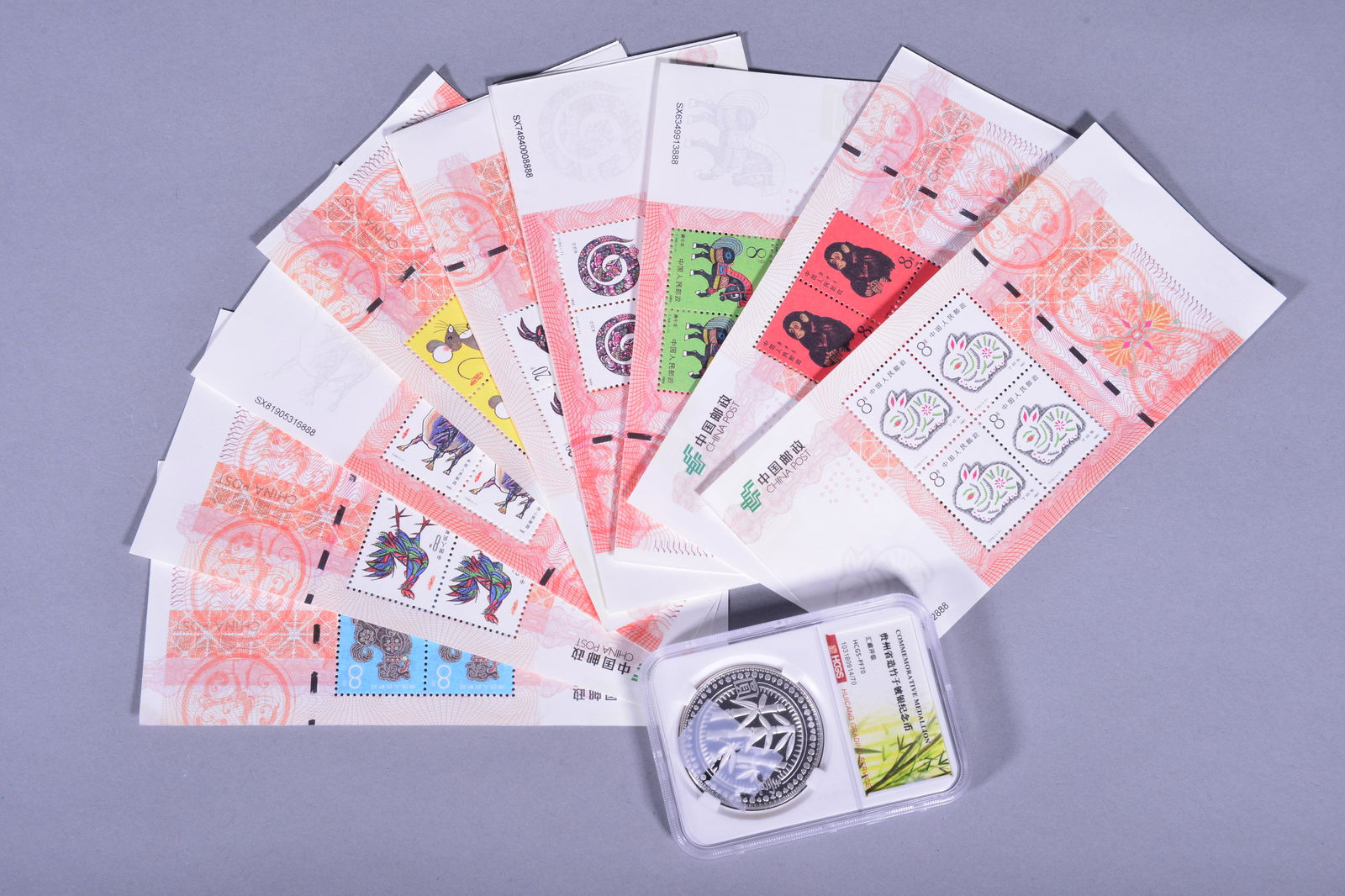 CHINA POSTAL STAMPS AND SILVER COIN (1 of 4)