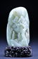 7: A WHITE JADE BOULDER CARVING. (QING DYNASTY)
