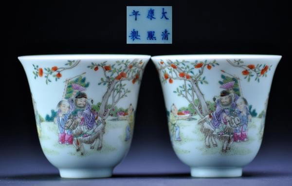 A PAIR OF FAMILLE-ROSE CUPS. (MARK OF KANGXI EARL: A PAIR OF FAMILLE-ROSE CUPS. (MARK OF KANGXI EARLY OF 20 CENTURY) a pair of famille-rose cups six character mark on base.2 3/4''x3''in.