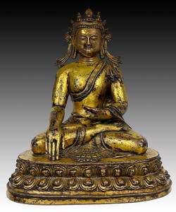 A GILT-BRONZE FIGURE OF SEATED SAKYAMUNI.YUAN DYNASTY