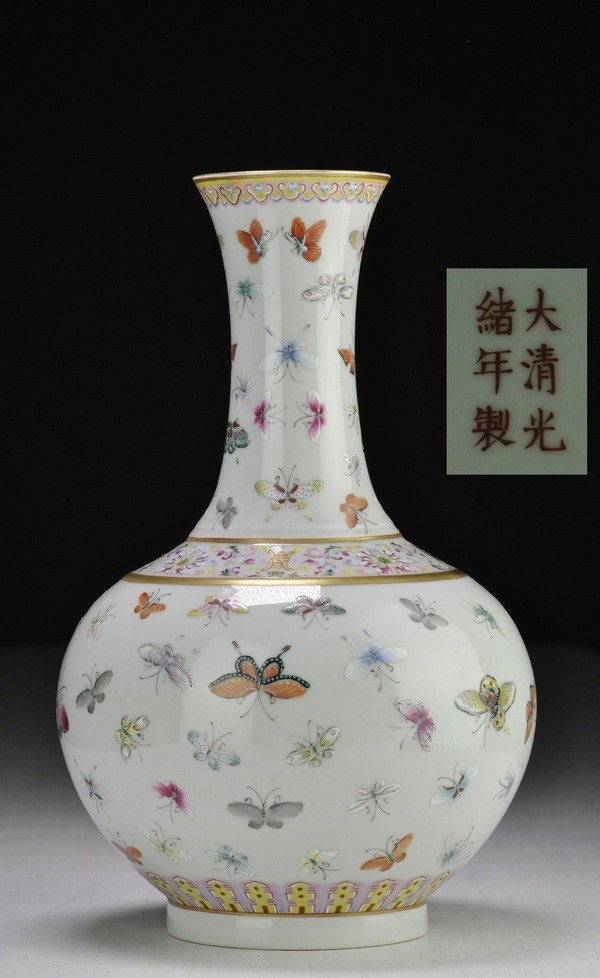 A FAMILLE ROSE 'BUTTERFLY' VASE.(GUANGXU MARK OF P: Finely enameled with butterflies within decorative borders and with a band of lotus and shou characters on the shoulder.15 1/4''H
