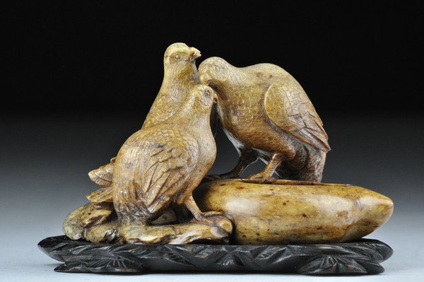 A SOAPSTONE BIRDS GROUP WATERPOT.: A soapstone birds group waterpot.4 3/4'' H 7 1.2'' L