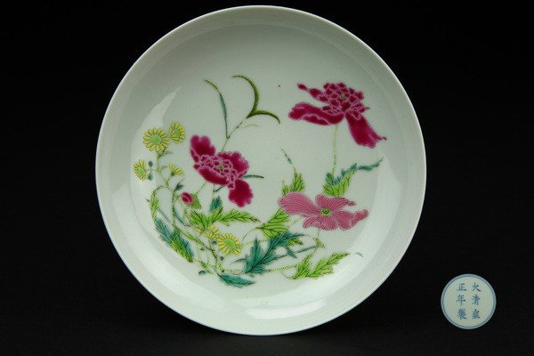 A FAMILLE-ROSE SHALLOW DISH.(MARK AND PERIOD OF YO: finely painted in the Boneless manner with two large blossming peonies borne on leafy branches ,YongZheng mark on base.1 1/4''H 6 1/2''Diam