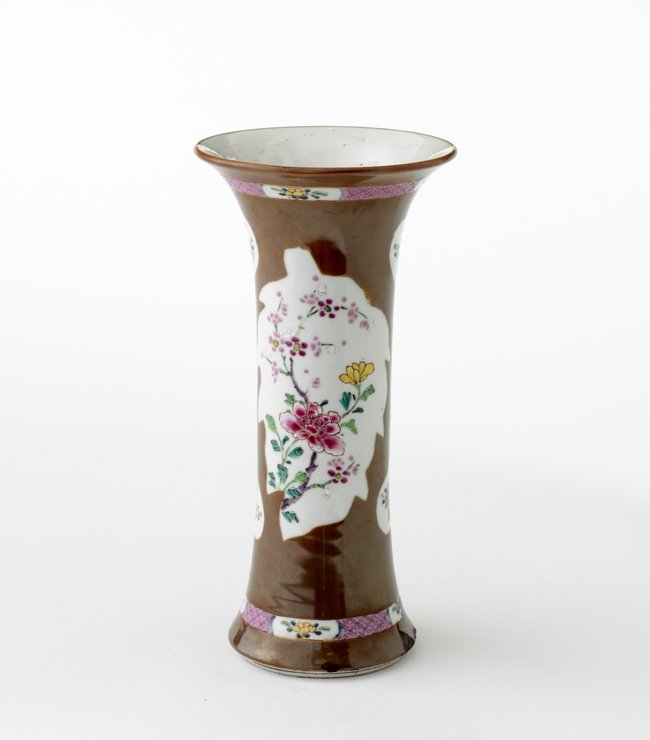 A FAMILLE-ROSE-DECORATED CAFÉ AU LAIT-GROUND BEAKE: A FAMILLE-ROSE-DECORATED CAFÉ AU LAIT-GROUND BEAKER VASE,QING DYNASTY, 9 1/4'' H this lot was sold on Christies