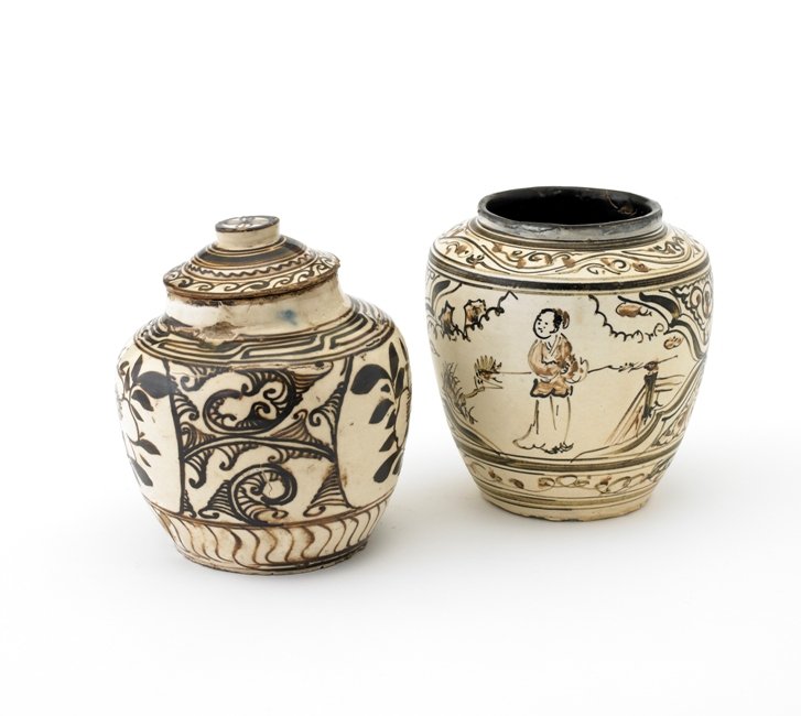 A PAIR OF OF CIZHOU PAINTED OVOID JARS,SONG DYNAS: Freely painted in dark brown on a white slip with two lozenge-shaped panels, one of painted with figures, the other with flower sprays below a foliate scroll border, 6 7/8'' H 6 1/8''H