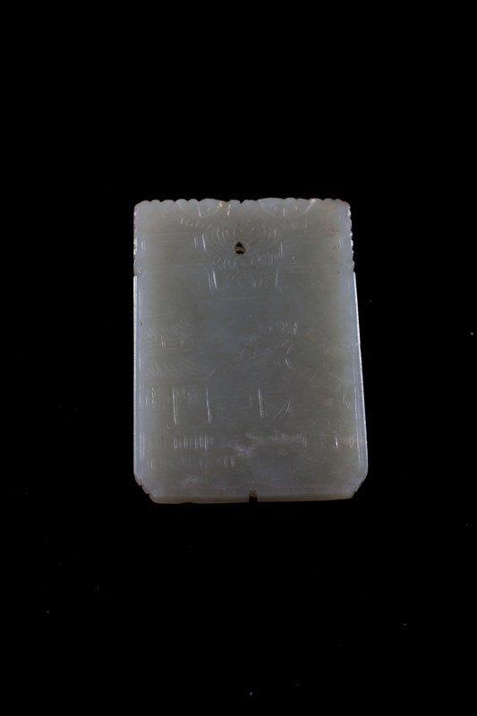A white jade plaque, 19TH CENTURY: 19TH CENTURY Plaque is crystal white jade even tone and rectangular shaped. Carving of a scenery of a front of a small village. On the back of the plaque decorated with imperial design and a marked se