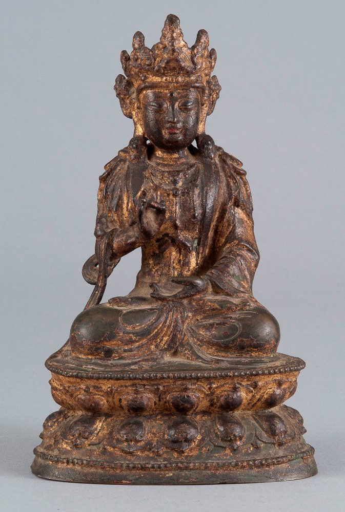 A GILT-LACQUERED FIGURE OF BODHISATTVA: 15-16TH CENTURY The figure is shown seated with right hand raised in vitarka mudra, the left hand held in dhyana mudra above the lap, and wearing a jeweled necklace and layered robes, as well as an op