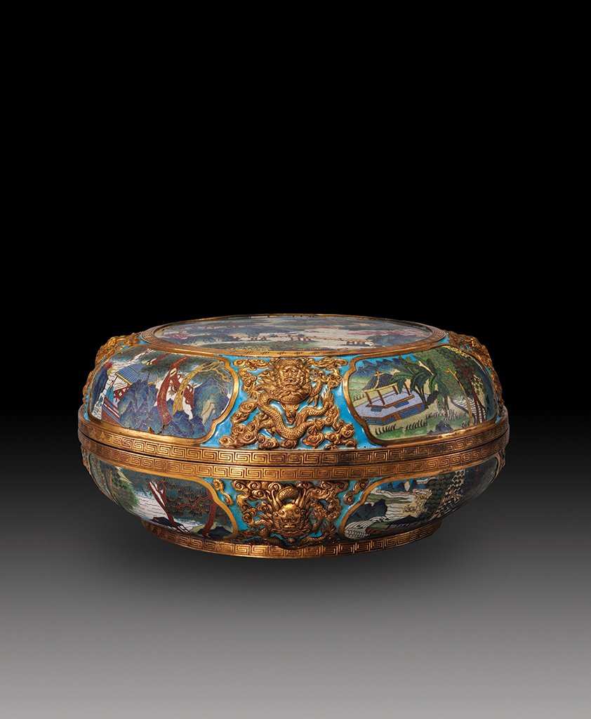 A GILT-BRONZE AND CLOISONNE ENAMEL DRAGONS BOX AND: MARK AND PERIOD OF QIANLONG The box and cover is globular- shaped and the exterioir is decorated with many dragons and scenes of the villages. 15 7/16 in. (39.3 cm) diameter, 6 13/16 (17.3 cm) tall.