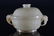 A CARVED WHITE JADE BOWL AND COVER