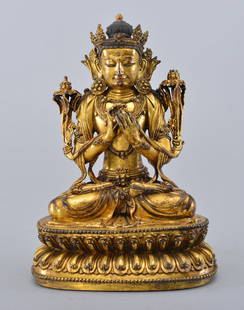 A GILT-BRONZE FIGURE OF MAITREYA: Ming Dynasty Finely cast seated in lalitasana on a double lotus base, both hands in prayer position, wearing a voluminous dhoti with incised hems, adorned with beaded necklaces, armlets and foliate