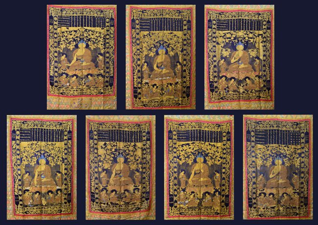 SEVEN OF SILK BUDDHIST THANGKAS: Qing Dynasty The eight buddha thangka is of similar decoration. The center is decorated with a seated buddha on a half lotus base, wearing a traditional robe, surrounded by a halo and numerous worship