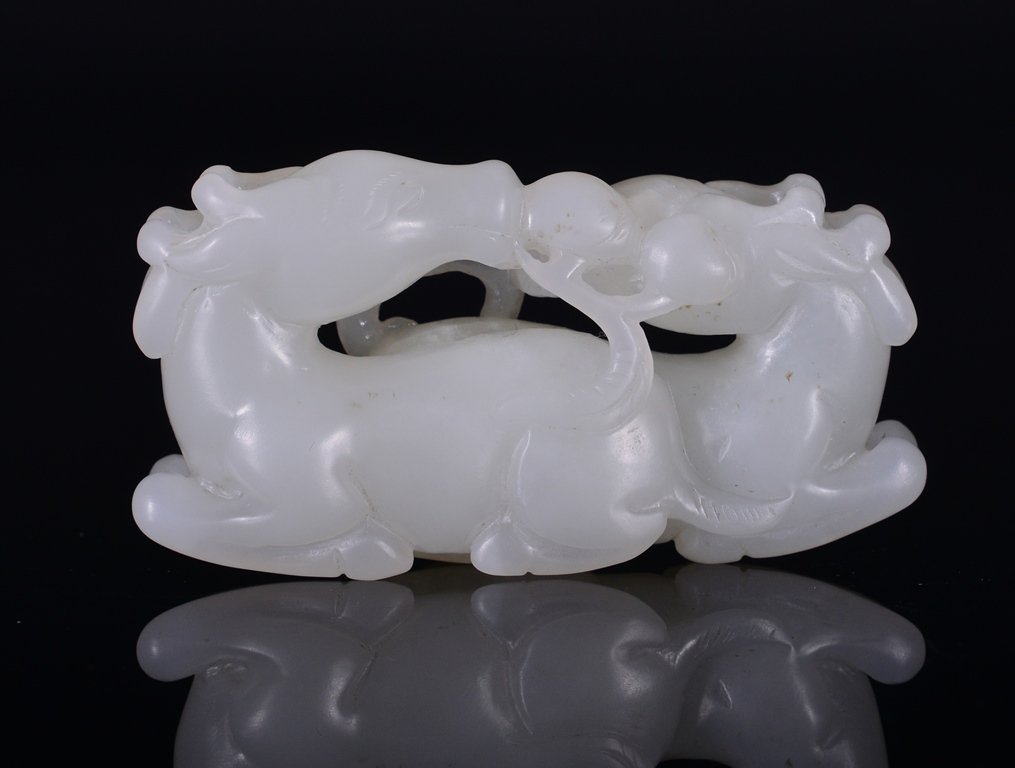A WHITE JADE CARVING OF DEER GROUP (1 of 4)