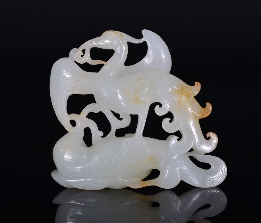 A WHITE JADE CARVING OF PHOENIX AND FISH (1 of 5)