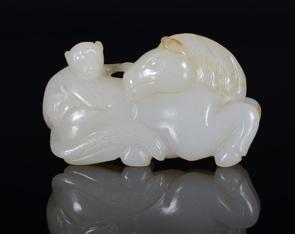 A WHITE JADE CARVING OF HORSE AND MONKEY (1 of 4)