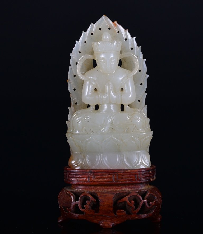 A WHITE JADE CARVING OF BUDDHA (1 of 3)