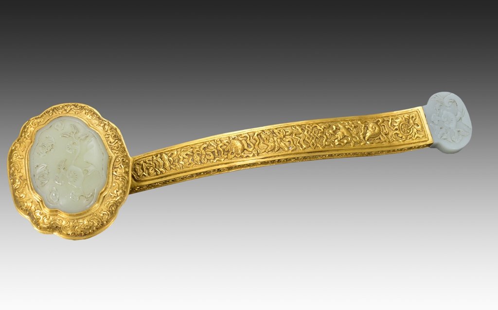 A CARVED WHITE JADE INLAID GILT-BRONZE RUYI SCEPTRE (1 of 8)