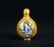A GILT-BRONZE ENAMELLED SNUFF BOTTLE