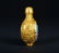 A GILT-BRONZE ENAMELLED SNUFF BOTTLE - 4